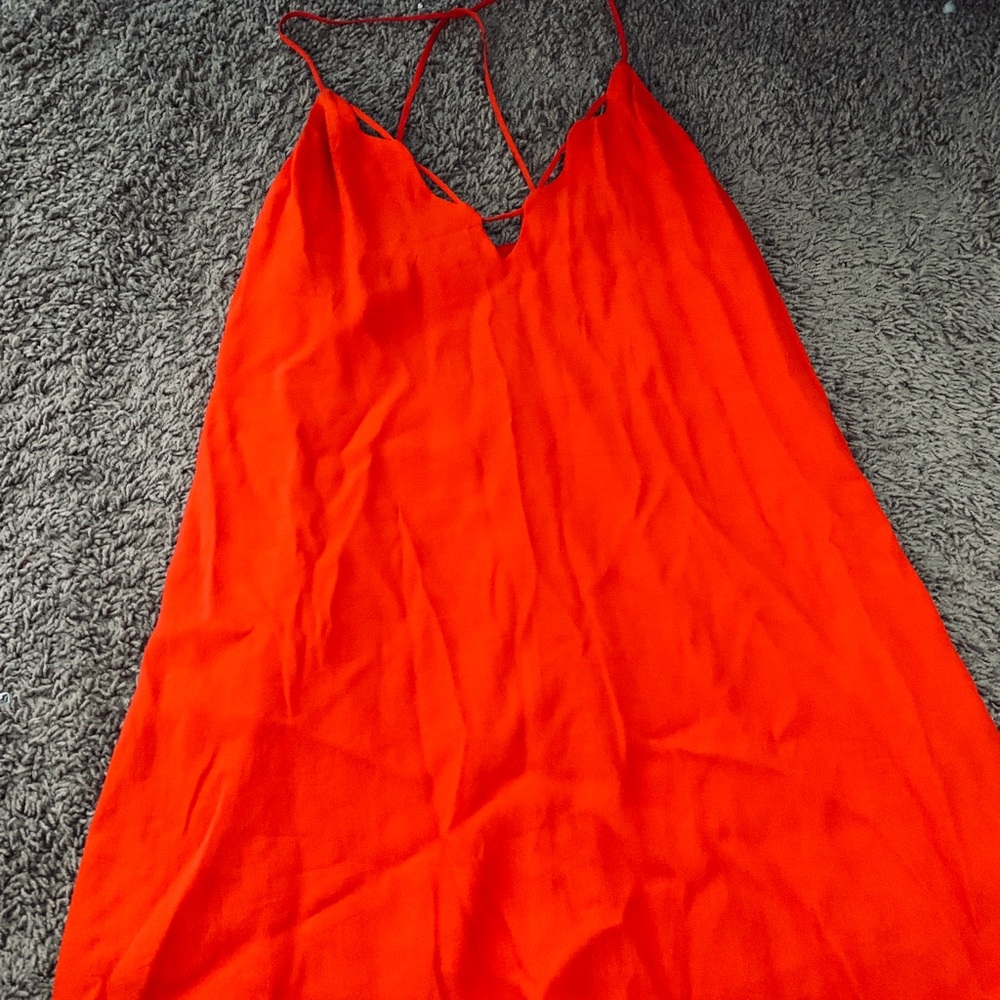 Orange mini dress, low back